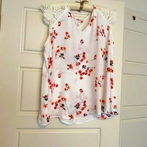 White blouse with lace shoulders